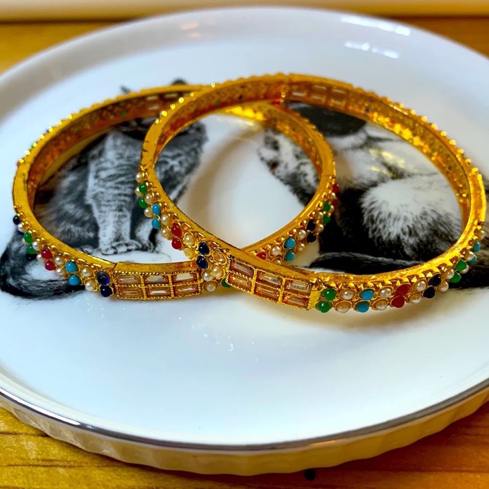 Beautiful set of 2 gold toned gemstones bangles